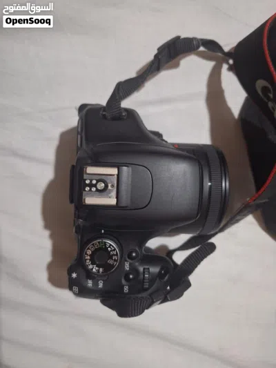 كاميرا Canon EOS 1300D مع عدسة العزل الشهيرة (50mm)** 4