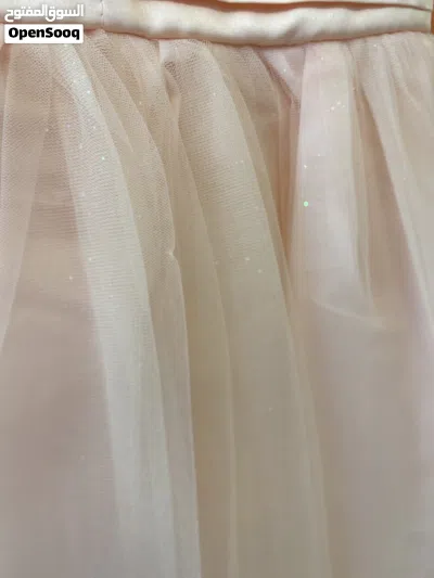 فستان أطفال مشمشي لميع نافش بحاله ممتازه 2