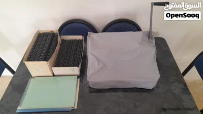 ماكنة أو آلة نوع HIC لتخريم / تكعيب وتجليد صور الكتب و الأبحاث بالسلك الحلزوني البلاستيك 2