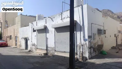بيتان أرضيان ومحلان بالأمام 2
