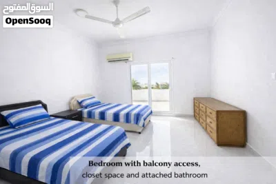 200 OMR- Spacious 2-Bedroom Penthouse Apartment with Balcony 2