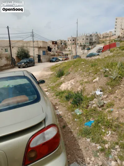 ارض بالمرقب على شارع مساحة 380متر للبيع بسعر مغري 2