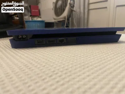 PlayStation 4 slim used -1tb blue limited edition. 3