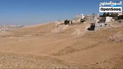 قطعة ارض في اجمل مناطق الزرقاء ضاحية المدينه المنوره بالقرب من مسجد احمد ياسين 2