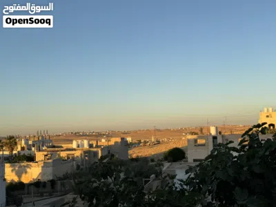 ارض مع تسوية للبيع 2