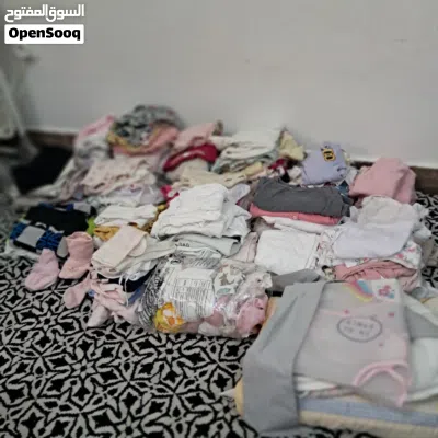 girls clothes 0-12 months mix dress,cap ,socks ,bip,all upto 50 clothes all 10bd 2