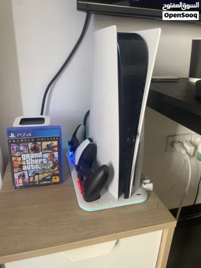 بلايستيشن فايف fat disk edition تأتي مع أيادي 2 و Rgb and cooling ps5 stand وCD GTAV 2