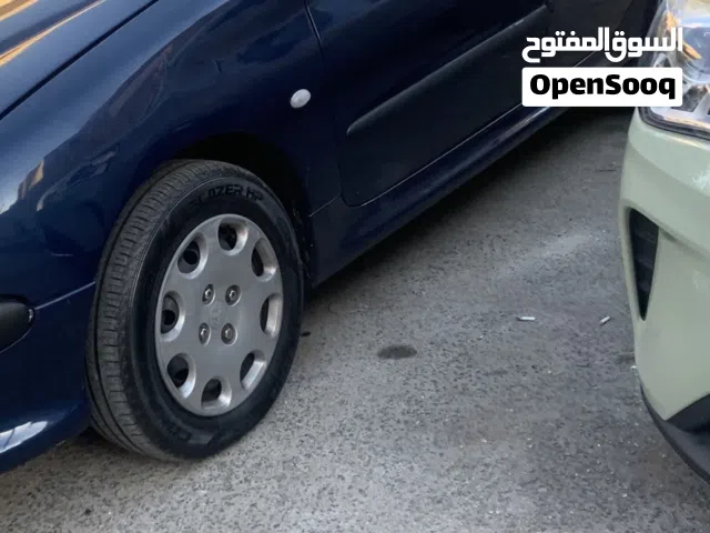 جنط بيجو 14 مع طاسات كوشوك جديد للبدل على جنط