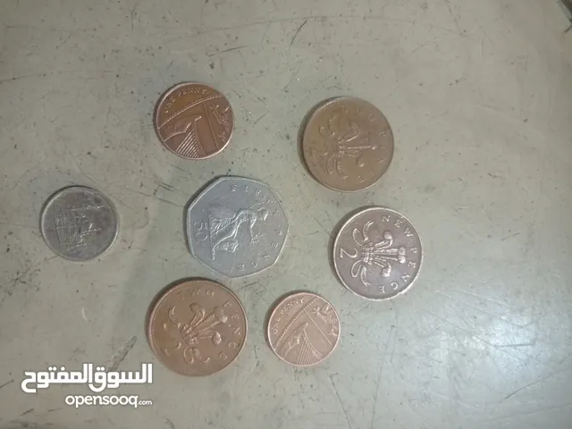 عملات قديمه نادره مختلفة للملكة اليزابيث وعشره قروش مصريه وعملات اخري