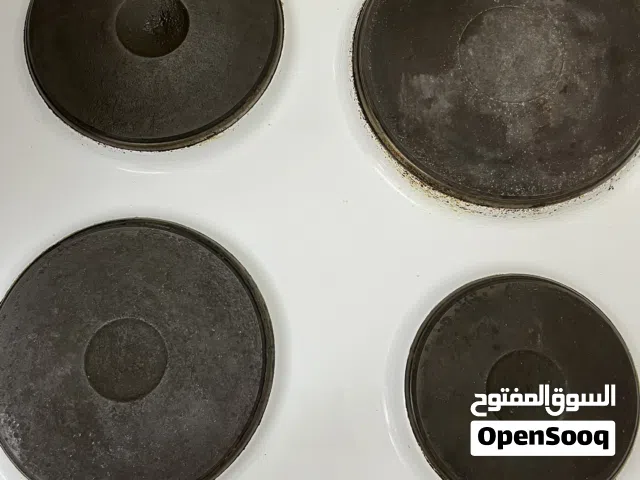 4 stoves and an attached oven