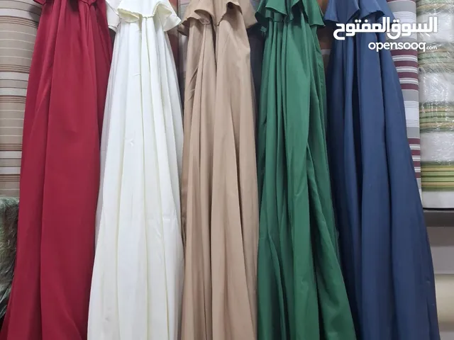 مظلات وحدائق خارجيه جميع الالوان والاحجام  موجودين في ابو علندا والجلود جميع انواع الجلود والاقمشه
