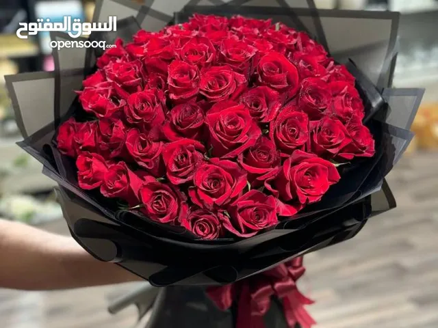 باقات ورد طبيعي صناعي حسب الطلب