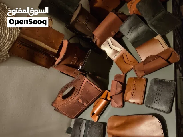 جلد طبيعي صناعه يدوية شنط ومحافظ