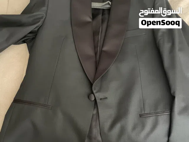 Black tuxedo with white tuxedo jacket and two shirts and waist band and two bow tie (red and black)