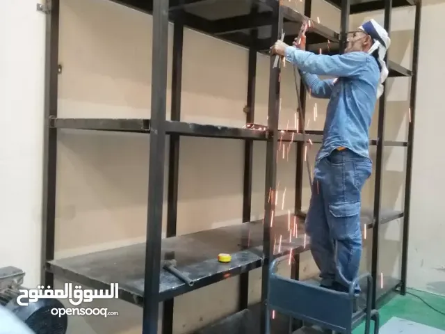 حداد مظلات سيارات وأبواب