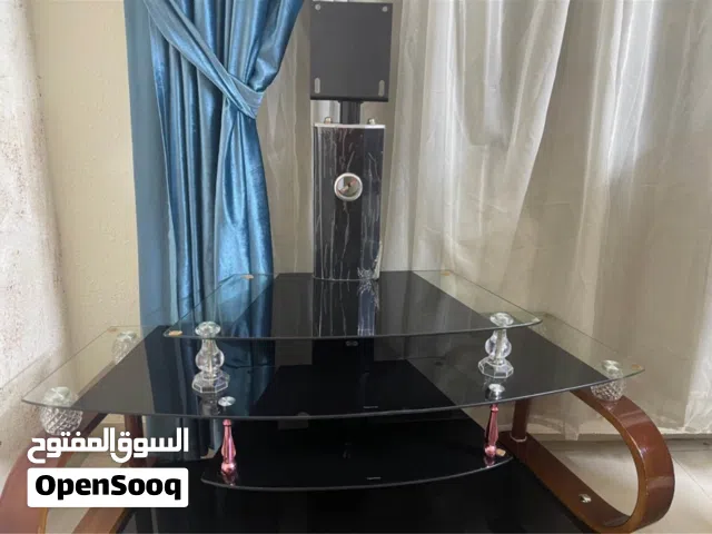 طاولة شاشة انيقة زجاج