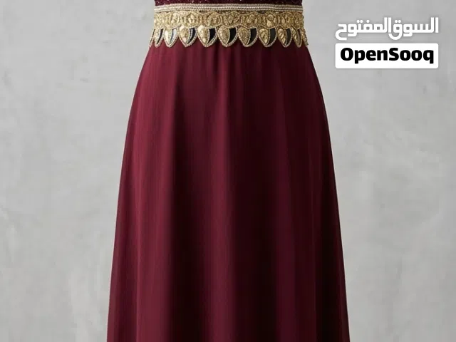 فستان سواريه عنابي ملكي في ذهبي قمة في الشياكة