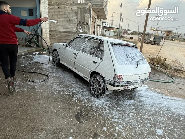 سيارة بيجو 205