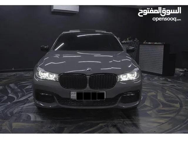 Bmw 740e M sport package 2017 أسمنتي مميز