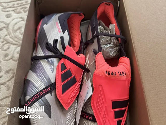 New unused football boots with receipt