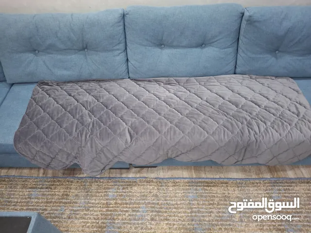 اغطية كنب لون سكني غامق تكفي ل 13 مقعد جداد غير مستعملات