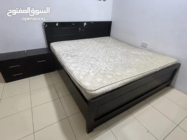 King Bed with mattress and side tables for just 10BD , urgent selling for low price.