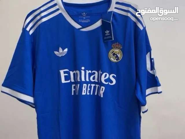 ملابس ريال مدريد و برشلونه