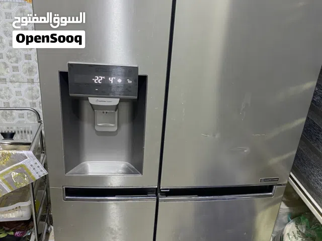 ثلاجة LG بايين عمودية باب ثلاجة وباب تجميد  شغاله 100% حالتها ممتازه حجمها كبير جدا