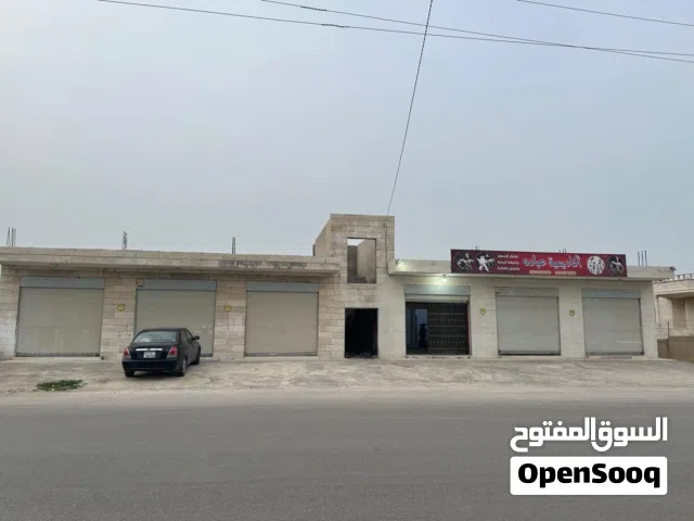 مخزن للايجار بجانب جيم ع الشارع الرئيسي