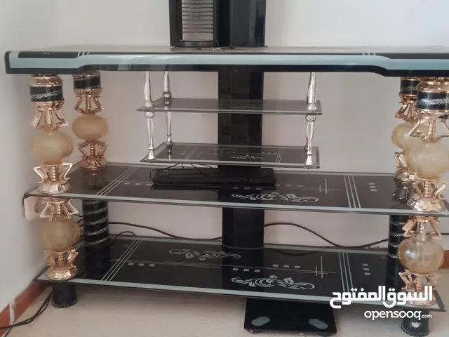 طاولة تلفاز زجاجية متعددة الرفوف