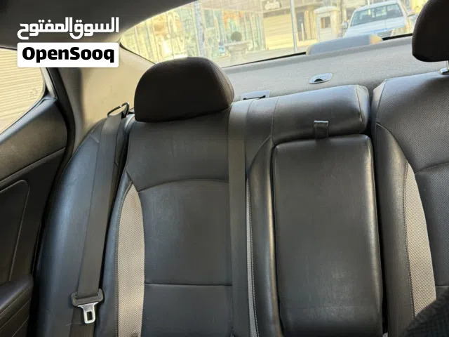 كيا اوبتيما Sx