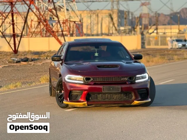 دودج تشارجر SXT 2019 لون العنابي، صالون سيدان، مستعملة بحالة ممتازة مع تقنيات حديثة
