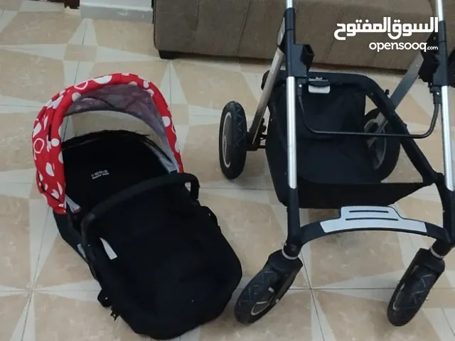 عرباية اطفال مستعملة استعمال بسيط شهرين للبيع بداعي لسفر بتنفع كمان كوت