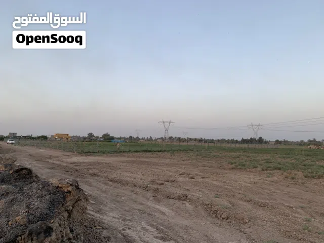بناية 200 متر ركن حي الحسين طابق واحد