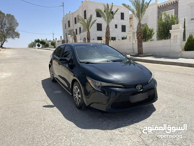 تويوتا كورولا 2020 هايبرد لون اسود حره باسم المستورد