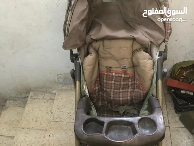 عرباية شارع للأطفال ماركة GRACO العالميه بحالة الجديد بسعر مغري