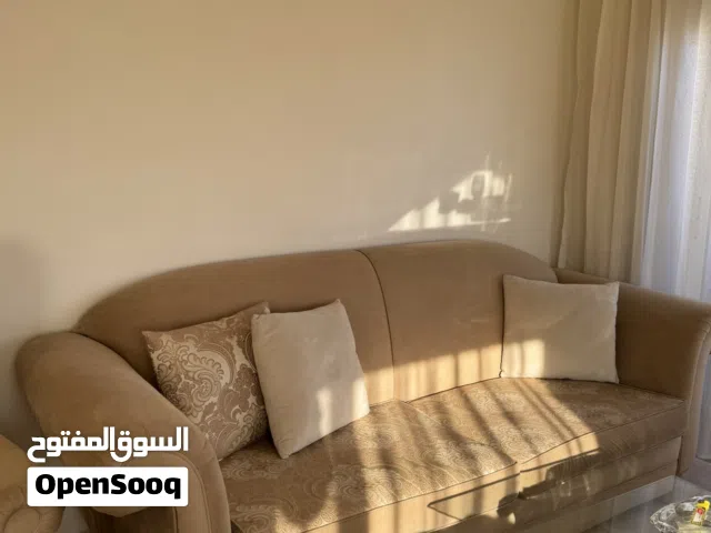 طقم كنب أمريكي مستورد  بيج - بحالة جيدة جداً - مستعمل