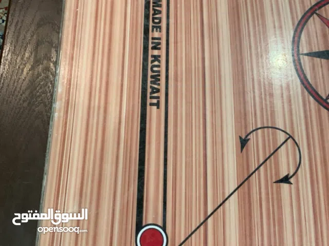 لعبه كيرم 9احجار بني 10احجار اسود مع حجرين احمر وحجر اساسي