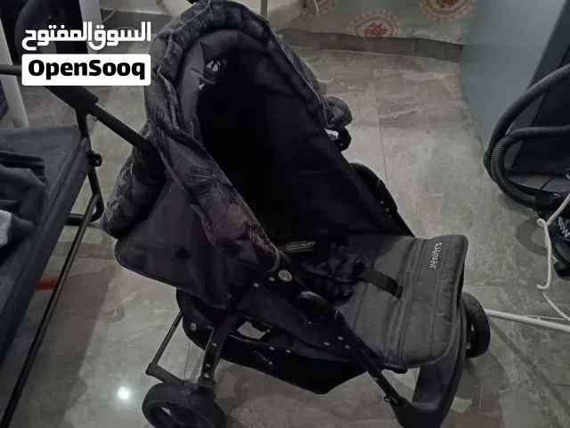 عربة اطفال جونيور بحالة ممتازة+ كرسي سيارة للاطفال + كرسي طعام للاطفال