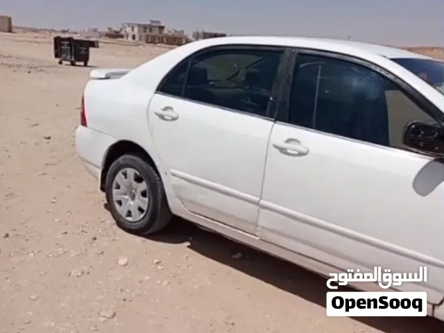 تويوتا كورلا 2001جير عادي جزاز تماتيك مكينه كبير