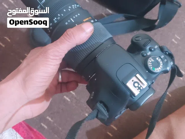 كيمرا كانون مع الزوم والشاحن والشنطه شبه جديد D600-eos