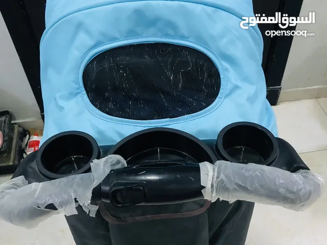 عربه اطفال ماركه جونيور حاله ممتازه شبه جديدة لون مميز بدون اي عيون