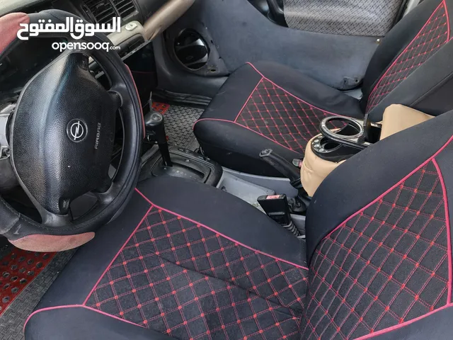 للبيع اوبل فيكترا 2001متور1800بانزين اتمات ستنرلوك شبابيك كهرابا شاشه اندرويد  ؟؟ تفاصيل على رقم وات