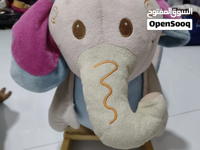 Wooden elephant swing toy