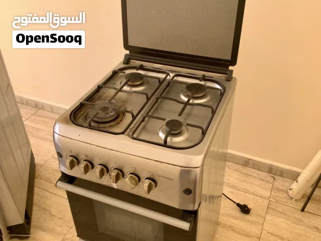 For sale: stove, automatic washing machine, bed, and refrigerator.