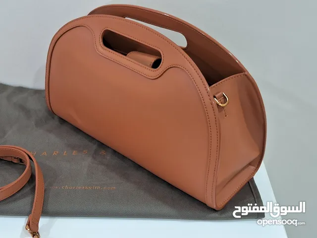 tags on new camel handbag unique with detachable strap