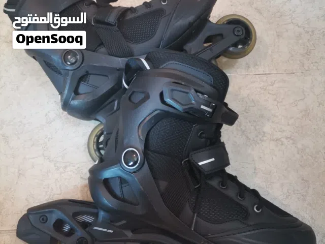 رول Oxelo مقاس 43 - مع الحماية والخوذة