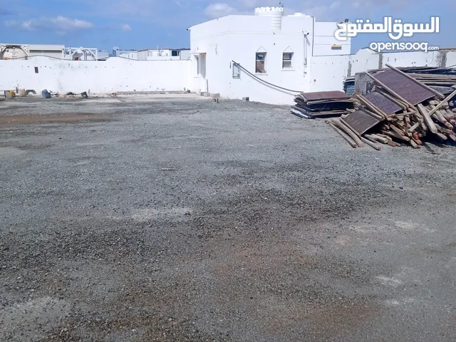 Industrial land for rent in Al misfah    أرض صناعية مسورة المسفاة