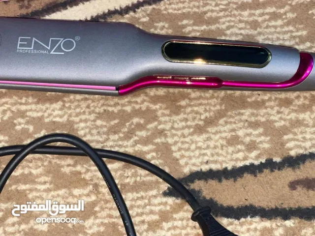 مكبس للشعر
