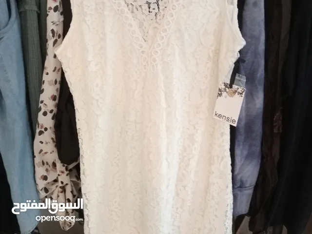 branded short dresses each 35 dhs 50 for 2 dresses